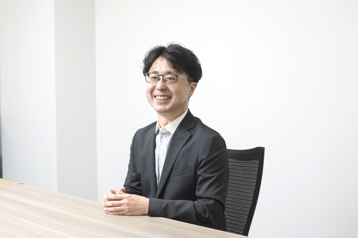 システム部 部長 直志